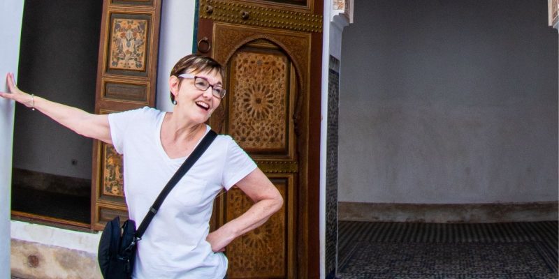 Denise with and on a pillar in a Morrocan palace
